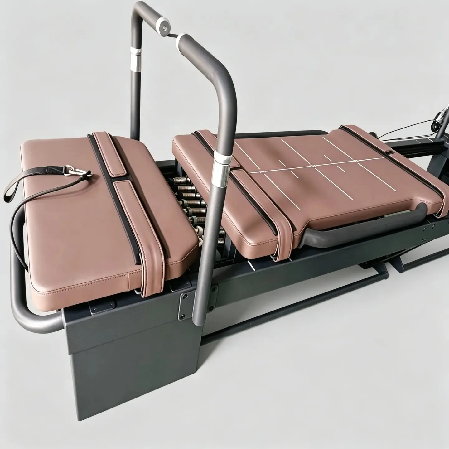 Brown-upholstered Carriage One commercial reformer for high-intensity studio classes